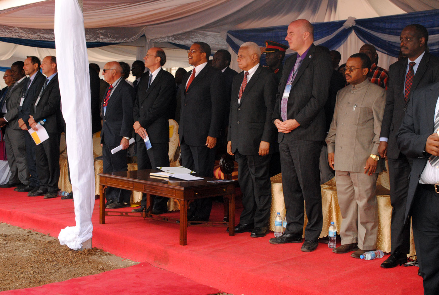 H.E. President Kikwete of Tanzania together with high-level dignitaries standing for the national anthem.