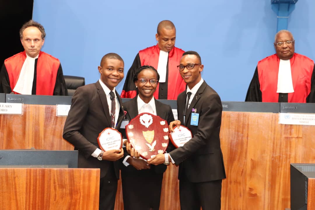 Runners Up: Nigeria (UYO University). From left to right: Abasibiangake Akpabio, Aniekan Udo-Okon (Best Speaker) and Victor Daniel