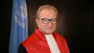 Judge Carmel Agius, President