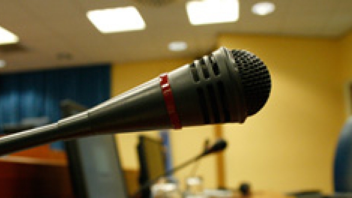 Image of witness stand with a microphone