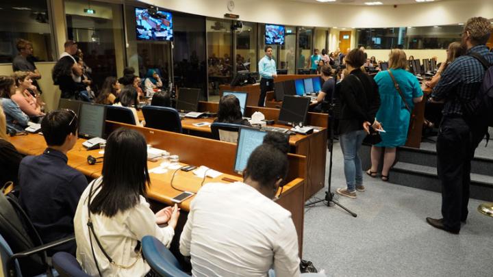 Visitors in a courtroom of the MICT-Hague Branch