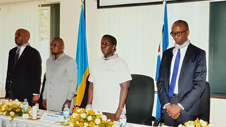 The Registrar of the Mechanism Elias Olufemi (right) joins (on his right) the East African Community (EAC) Deputy Secretary General of Finance and Administration Jesca Eriyo; the Guest of Honour and Regional Commissioner of Arusha Mrisho Gambo; and the Rwanda High Commissioner to Tanzania Eugene Kayihura in a memorial service, in remembrance of the victims of the Rwanda genocide. The event took place at the head office of the (EAC) in Arusha.