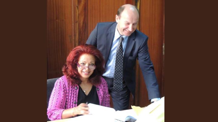 Halima Mohamed, Chairperson of the Tender Opening Committee, with MICT Registrar John Hocking