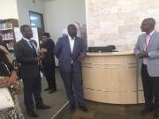 The President of the ECOWAS Community Court of Justice, Judge Jérôme Traoré (center), receives a briefing on the functions of the library as part of his visit to the Mechanism's office in Arusha on 28 February 2018.